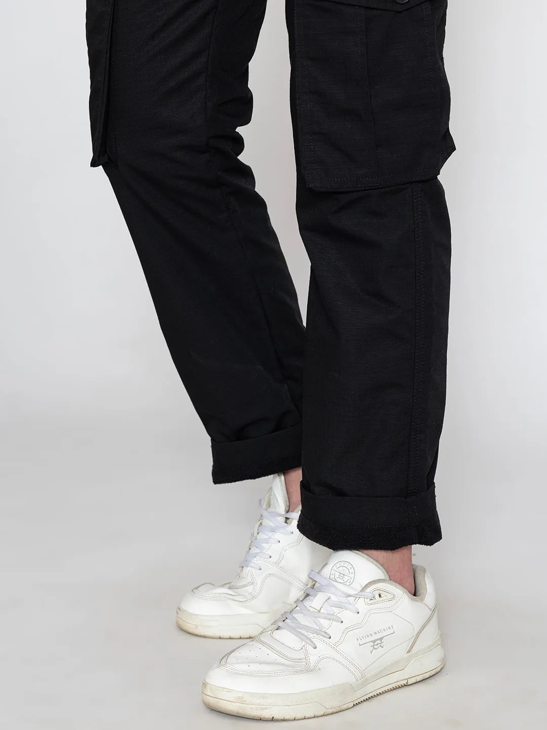 BLACK FLEECE CARGO PANTS.